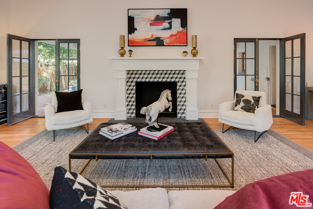 2529 North Commonwealth Avenue Los Angeles, CA 90027 - Photo 8 of 45 a living room with furniture and a fireplace