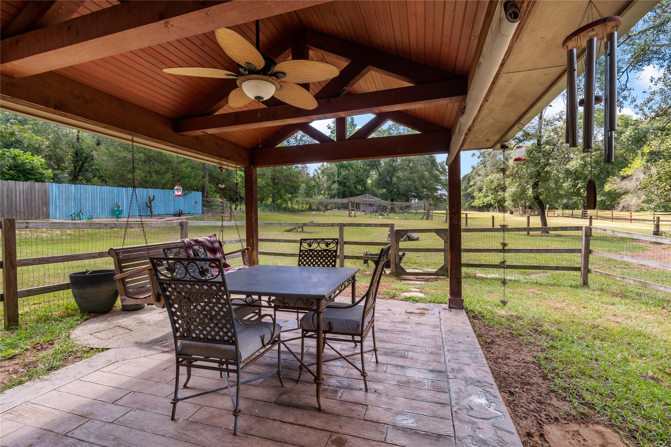 891 Lower Vann Road Coldspring, TX 77331 - Photo 11 of 23 a view of a backyard with sitting area and furniture