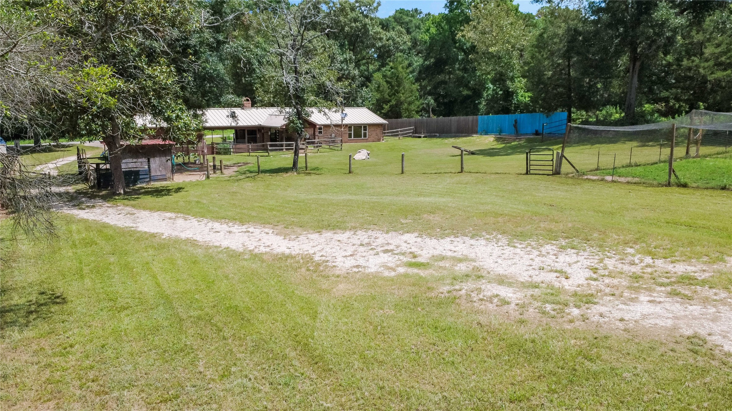 891 Lower Vann Road Coldspring, TX 77331 - Photo 13 of 23 a view of a park with large trees