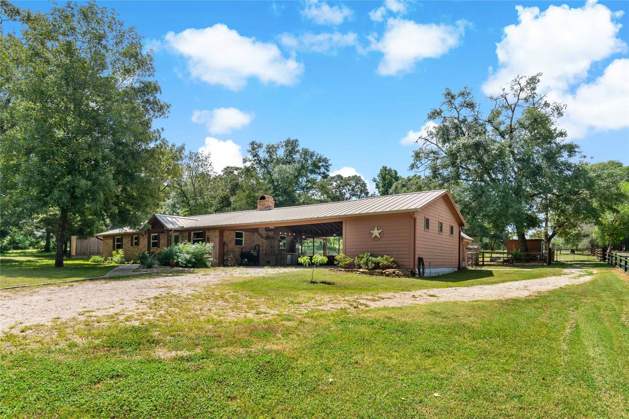 891 Lower Vann Road Coldspring, TX 77331 - Photo 5 of 23 a view of a house with a yard
