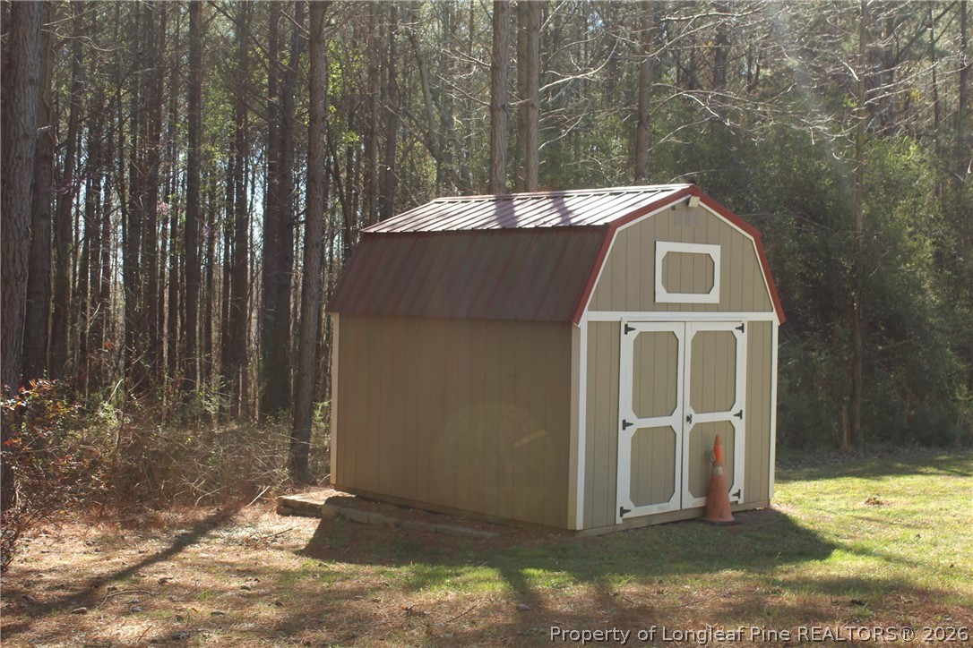 951 Lucian Hilliard Road Goldston, NC 27252 - Photo 24 of 25 a view of a door of the house