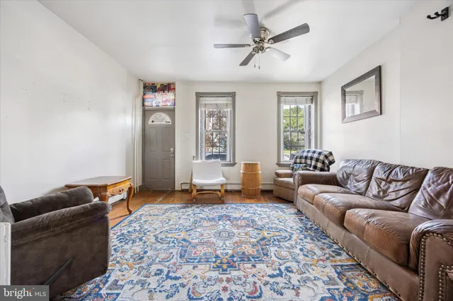 a living room with furniture and a couch