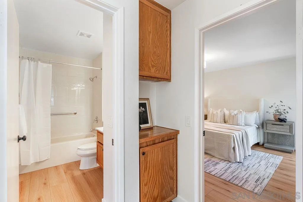 13489 Ridley Road San Diego, CA 92129 - Photo 20 of 36 a bathroom with a sink toilet and shower