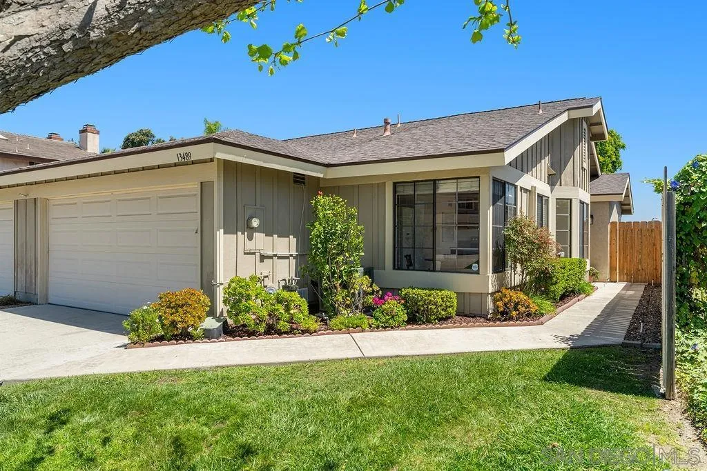 13489 Ridley Road San Diego, CA 92129 - Photo 3 of 36 a front view of a house with garden