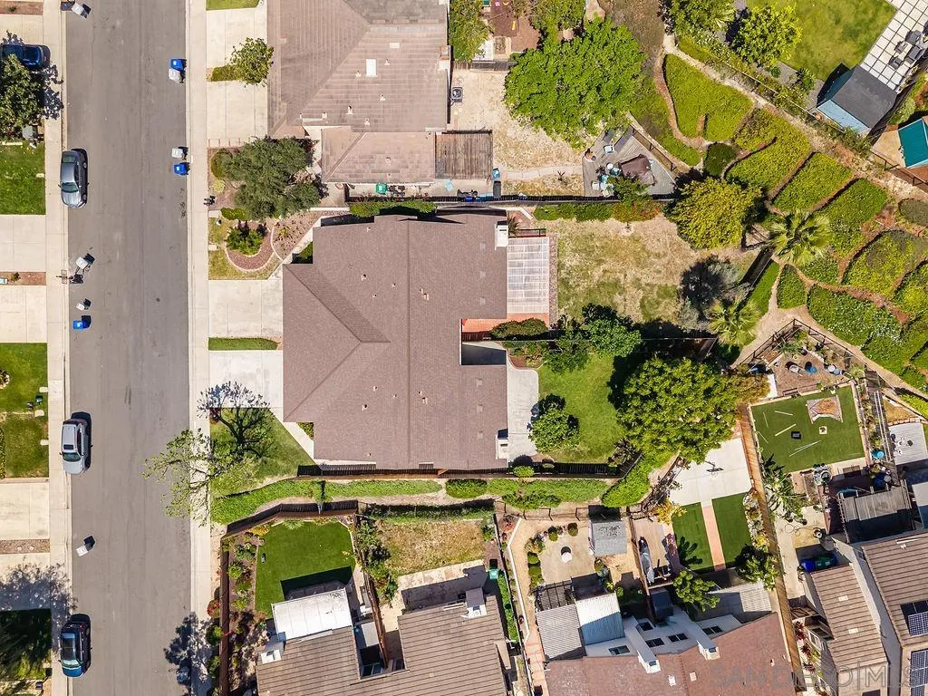 13489 Ridley Road San Diego, CA 92129 - Photo 34 of 36 an aerial view of a house with a yard and pool