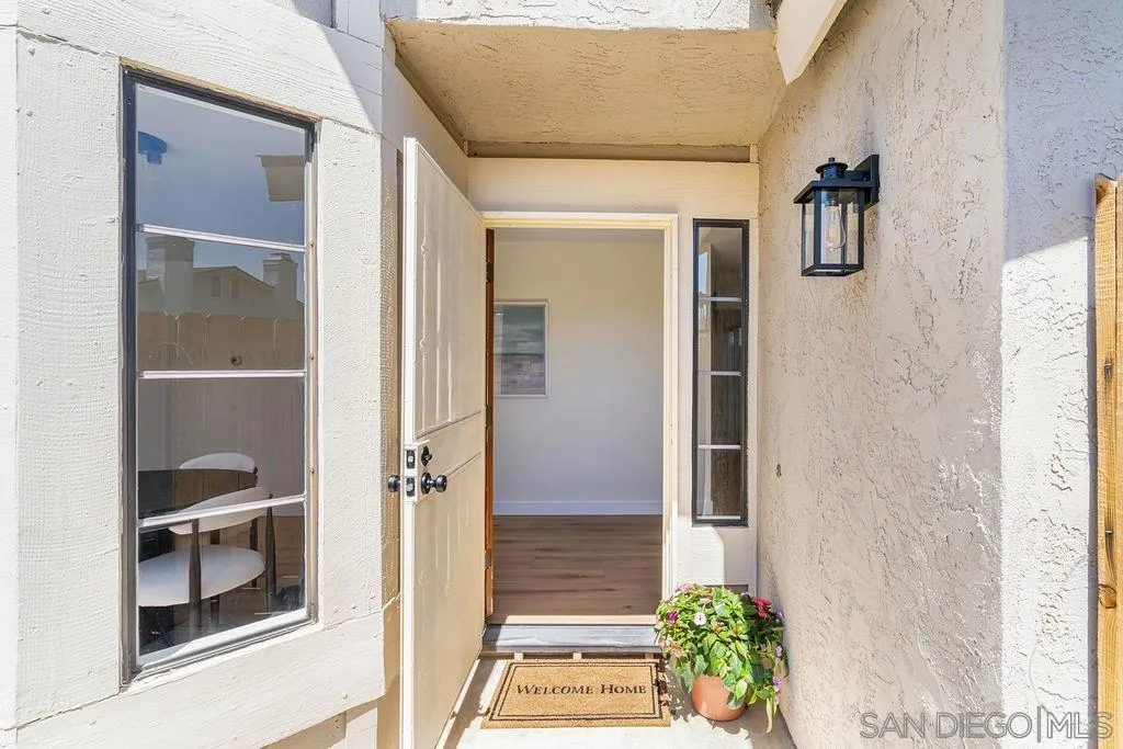 13489 Ridley Road San Diego, CA 92129 - Photo 5 of 36 a front view of a house with a window