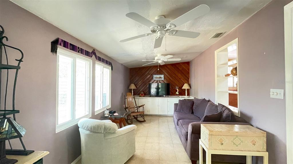 2233 Alice Road Sarasota, FL 34231 - Photo 20 of 30 a living room with furniture and a large window