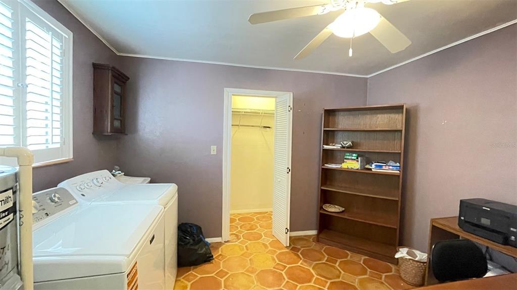 2233 Alice Road Sarasota, FL 34231 - Photo 22 of 30 a storage room with washer and dryer