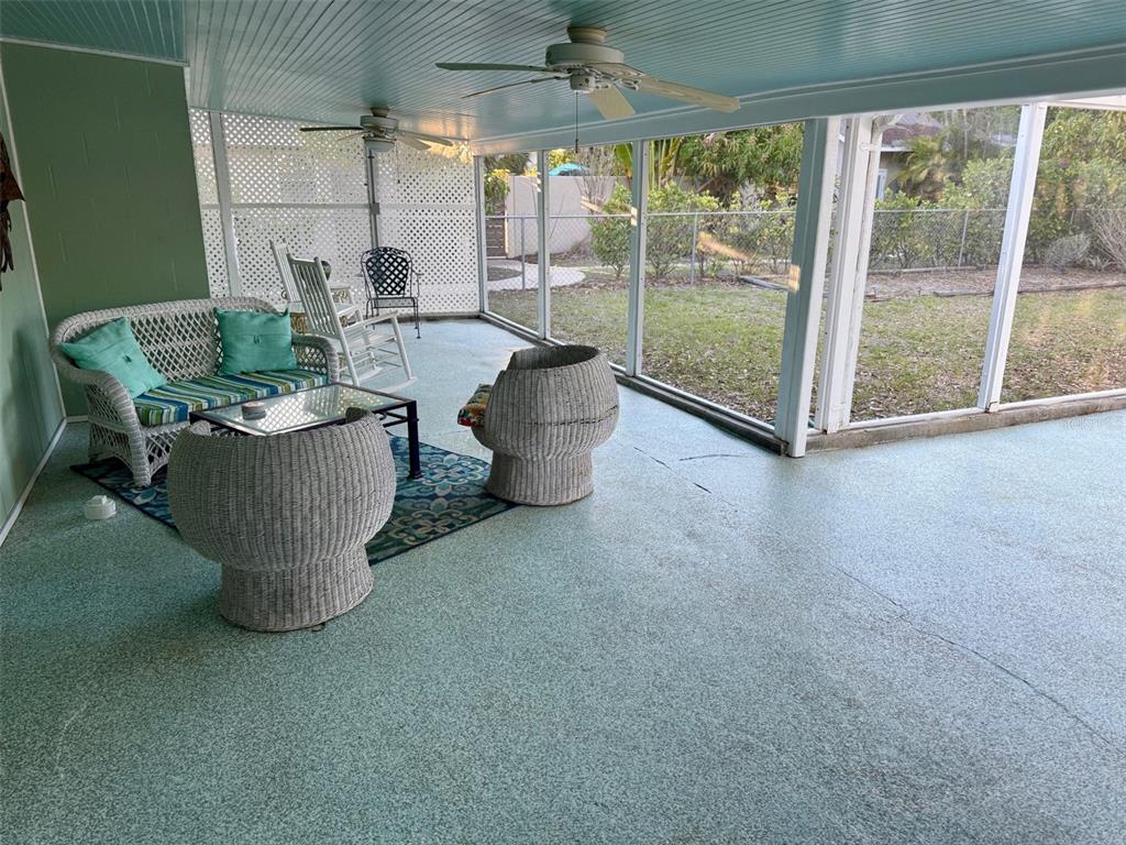 2233 Alice Road Sarasota, FL 34231 - Photo 23 of 30 a room with a table and chairs