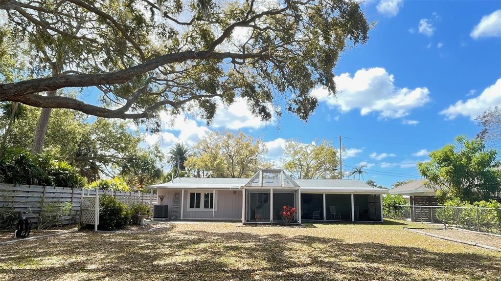 2233 Alice Road Sarasota, FL 34231 - Photo 25 of 30 a front view of a house with a yard