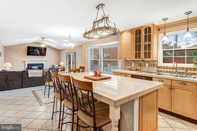 a view of a dining room with furniture and window