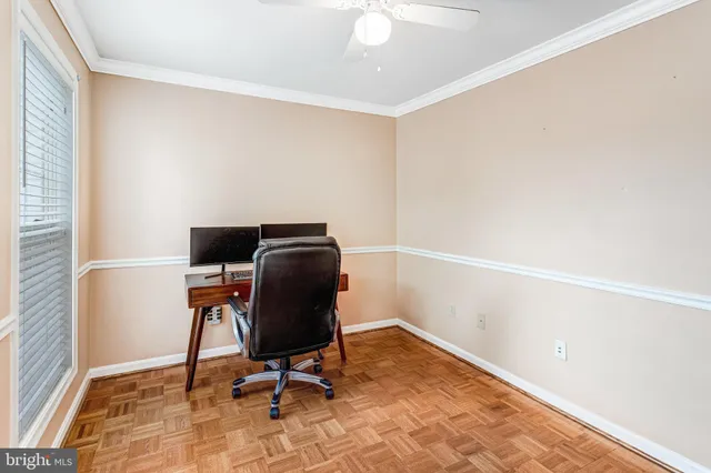 a view of workspace with wooden floor