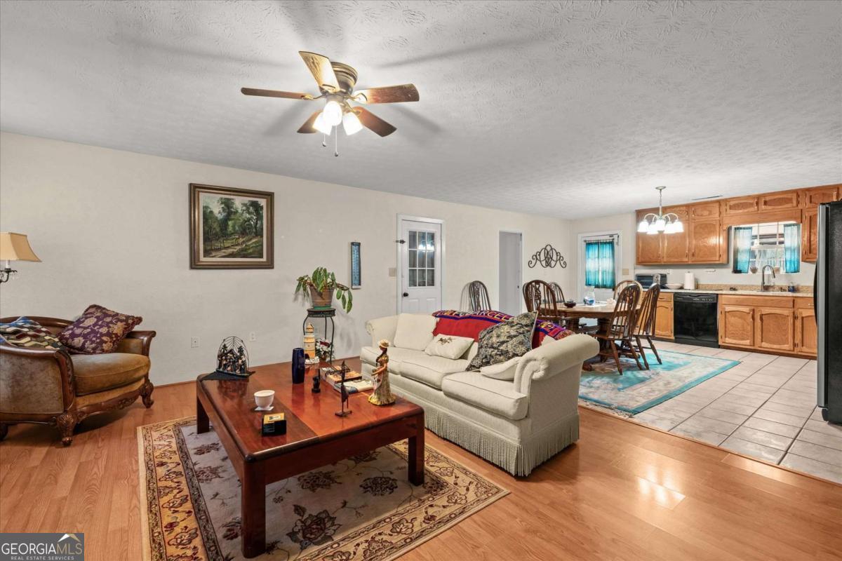 40-l Z L Z Jackson Road Bowdon, GA 30108 - Photo 5 of 32 a living room with furniture kitchen view and a window