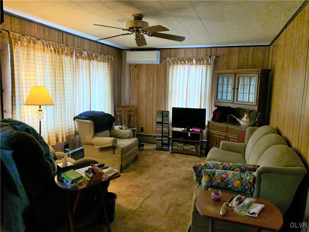729 Bushkill Center Road Nazareth, PA 18064 - Photo 4 of 9 a living room with furniture and a window