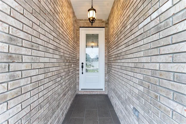 a view of a pathway besides a house