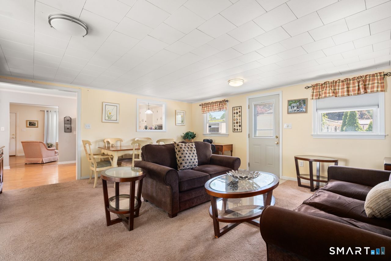 9 Stanton Road North Haven, CT 06473 - Photo 12 of 35 a living room with furniture and a large window