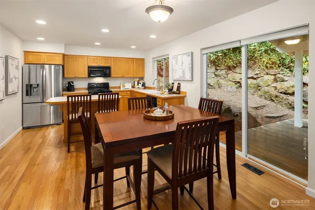 a bathroom with a sink toilet and mirror