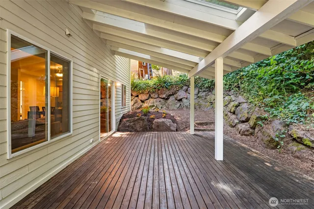a view of porch with wooden floor