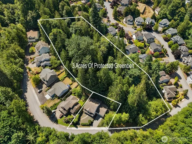 a view of a city with mountains in the background