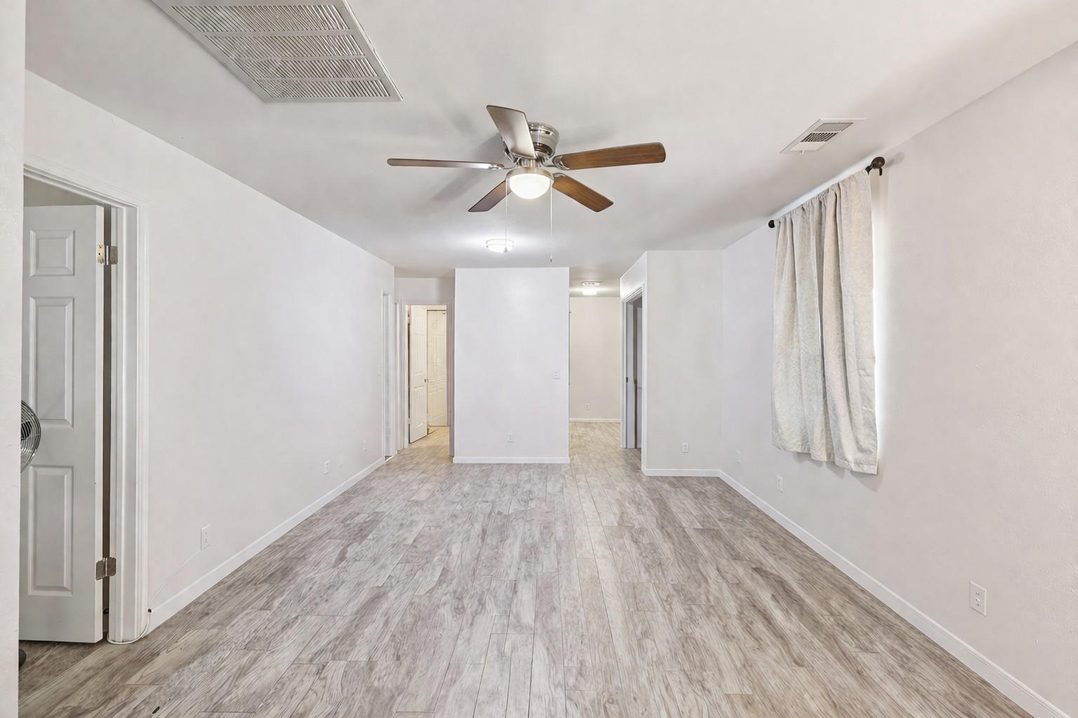 200 Monterrey Street, Unit A & B Elgin, TX 78621 - Photo 2 of 32 Living room with light wood finished floors. 200 Monterrey, Elgin, TX 78621