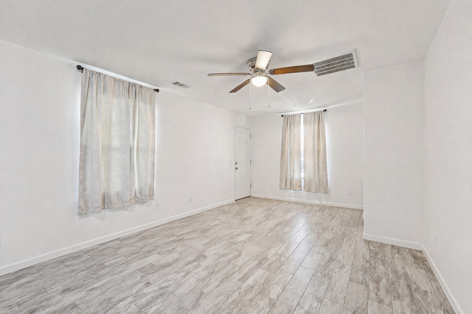 200 Monterrey Street, Unit A & B Elgin, TX 78621 - Photo 4 of 32 Open living room with natural light. 200 Monterrey, Elgin, TX 78621