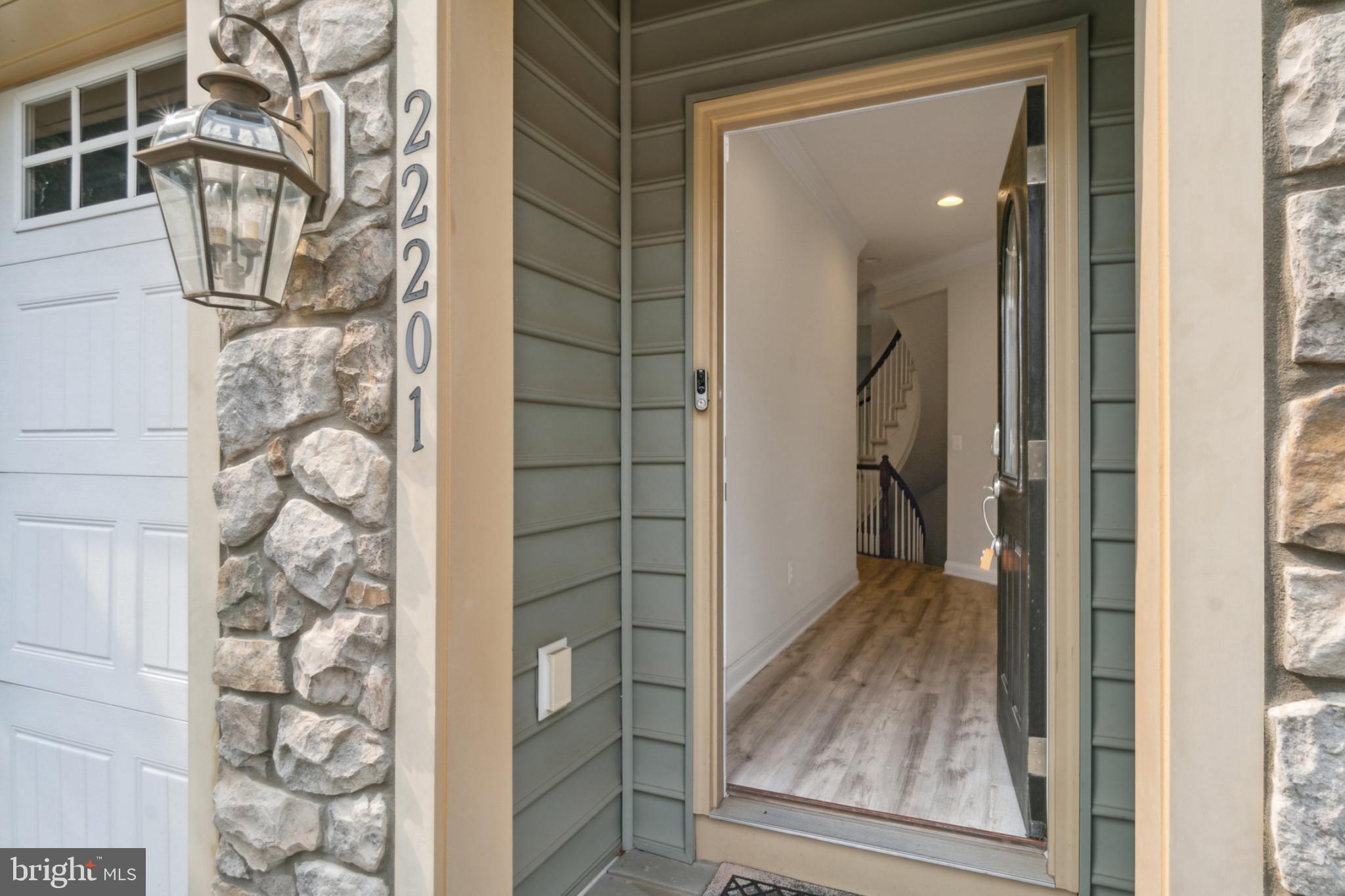 22201 Falling Terrace Ashburn, VA 20148 - Photo 4 of 26 Inviting entryway with modern charm.