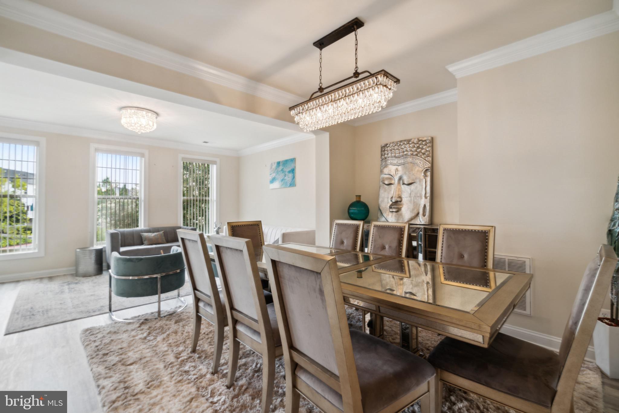 22201 Falling Terrace Ashburn, VA 20148 - Photo 5 of 26 Elegant dining space with serene decor.