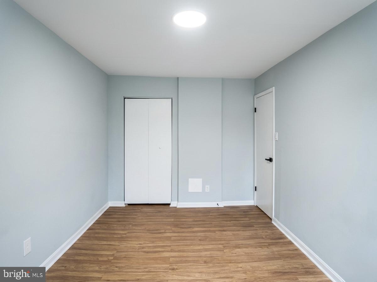 21 Neves Court Baltimore, MD 21234 - Photo 11 of 23 a view of room with wooden floor
