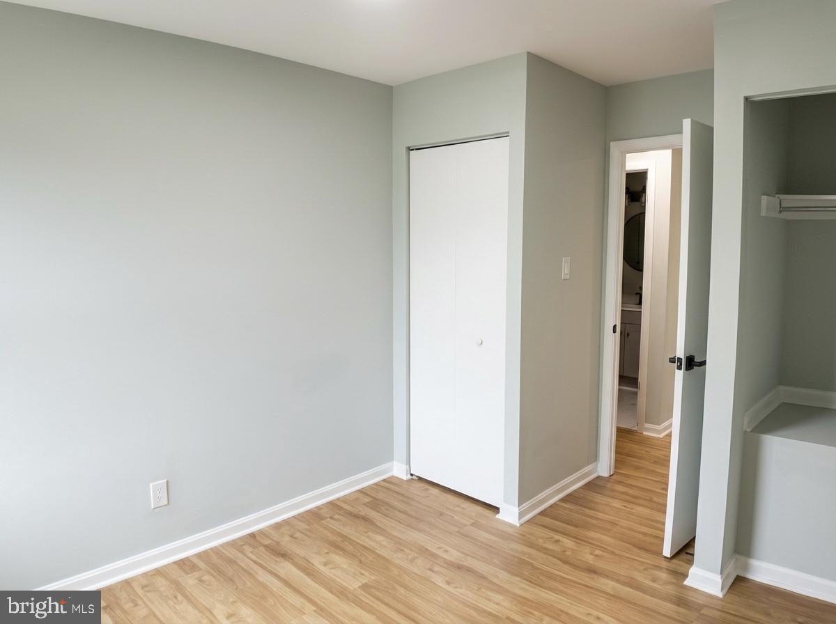21 Neves Court Baltimore, MD 21234 - Photo 14 of 23 a view of hallway with wooden floor