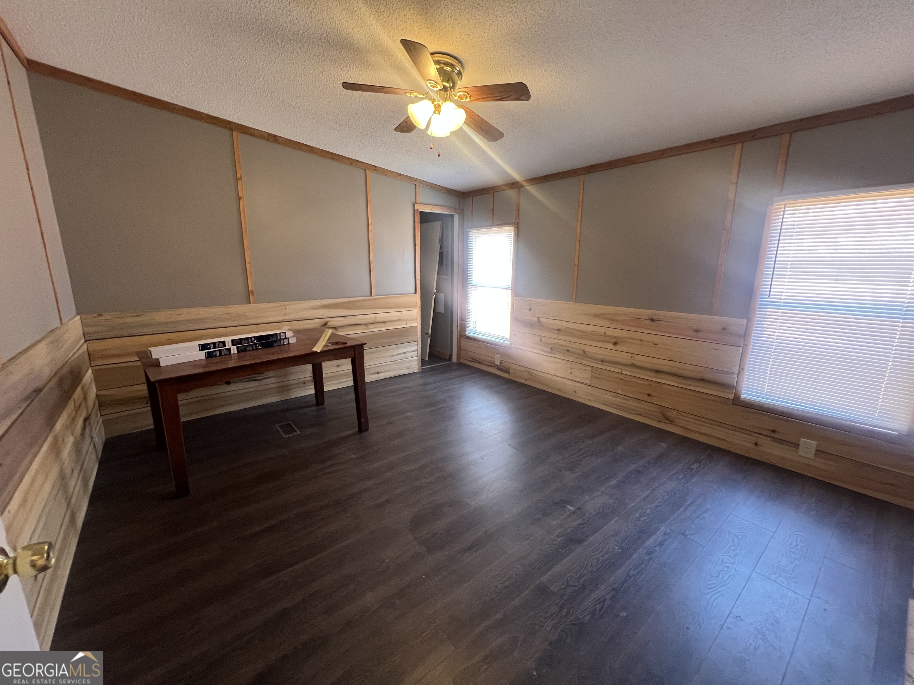 1425 Dowdy Road Roopville, GA 30170 - Photo 21 of 31 a view of a room with wooden floor and a window