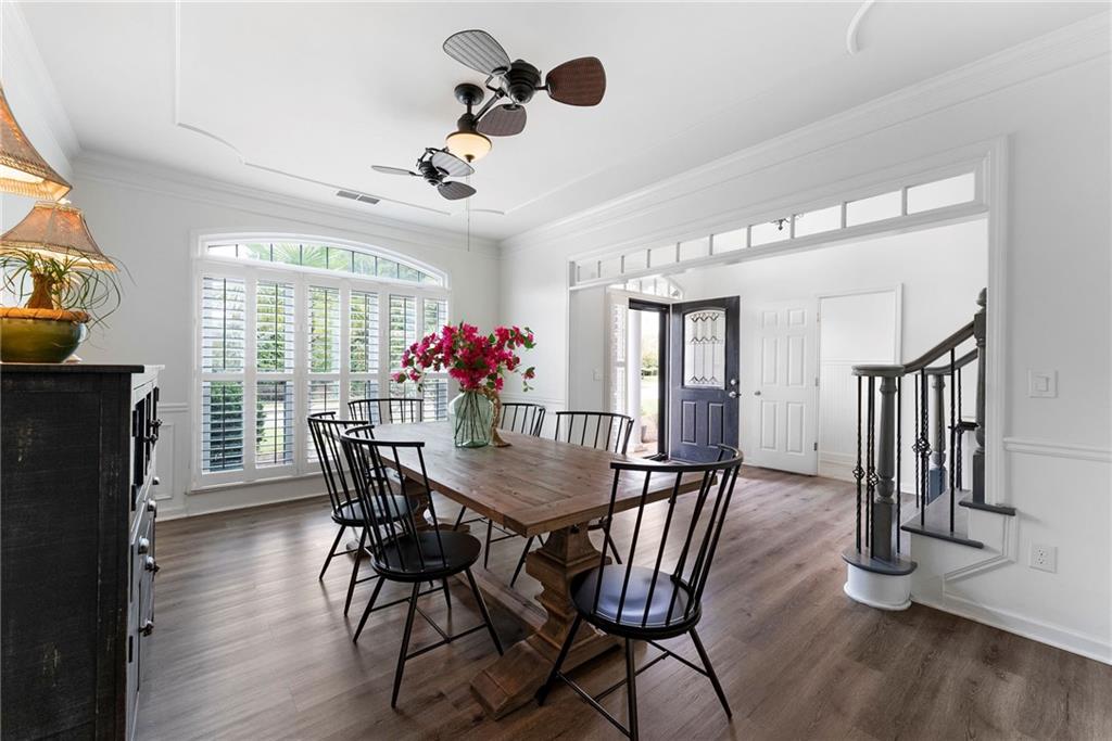 820 Nob Ridge Drive Southwest Marietta, GA 30064 - Photo 11 of 45 a view of a dining room with furniture window and wooden floor