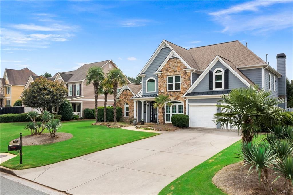 820 Nob Ridge Drive Southwest Marietta, GA 30064 - Photo 2 of 45 a front view of house with yard and green space