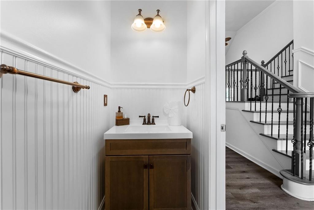 820 Nob Ridge Drive Southwest Marietta, GA 30064 - Photo 21 of 45 a bathroom with a sink and a mirror