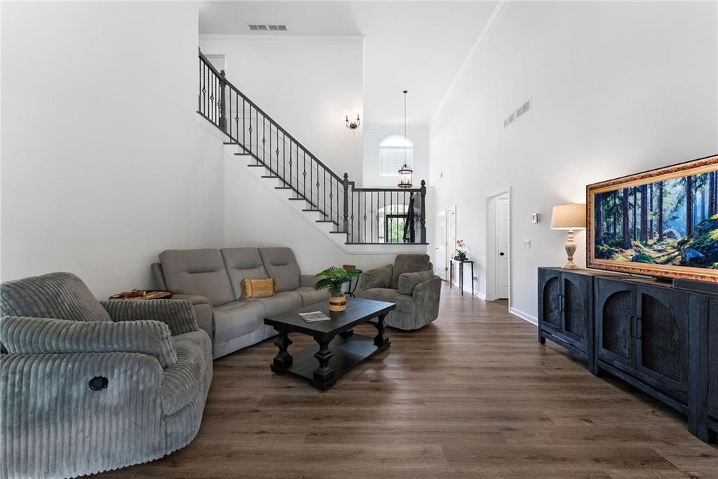 820 Nob Ridge Drive Southwest Marietta, GA 30064 - Photo 22 of 45 a living room with furniture and a wooden floor