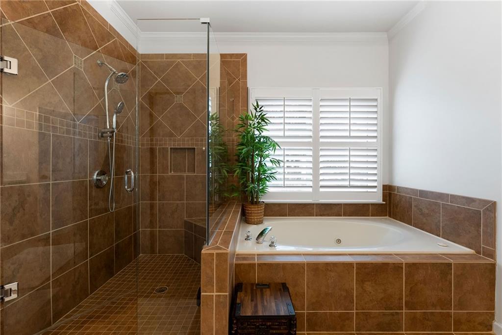 820 Nob Ridge Drive Southwest Marietta, GA 30064 - Photo 27 of 45 a bathroom with a shower and a sink