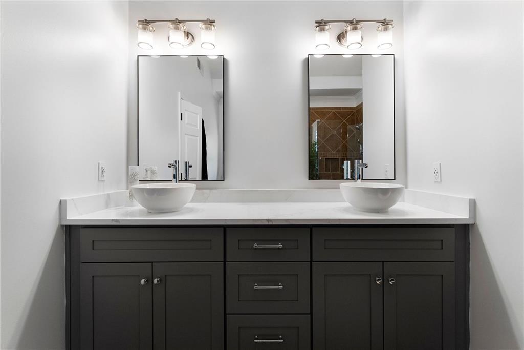 820 Nob Ridge Drive Southwest Marietta, GA 30064 - Photo 28 of 45 a bathroom with double sink and two mirror
