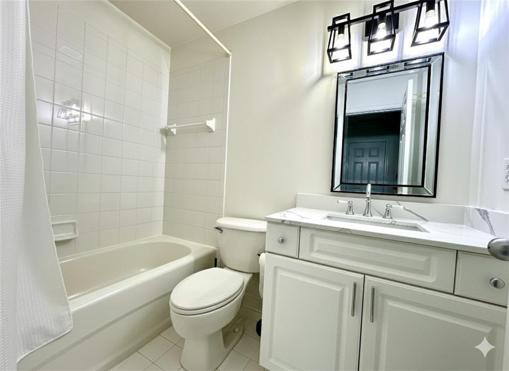 820 Nob Ridge Drive Southwest Marietta, GA 30064 - Photo 30 of 45 a bathroom with a sink a toilet and shower