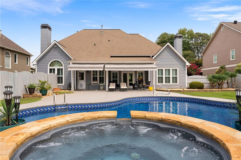 820 Nob Ridge Drive Southwest Marietta, GA 30064 - Photo 37 of 45 a view of a house with swimming pool and porch