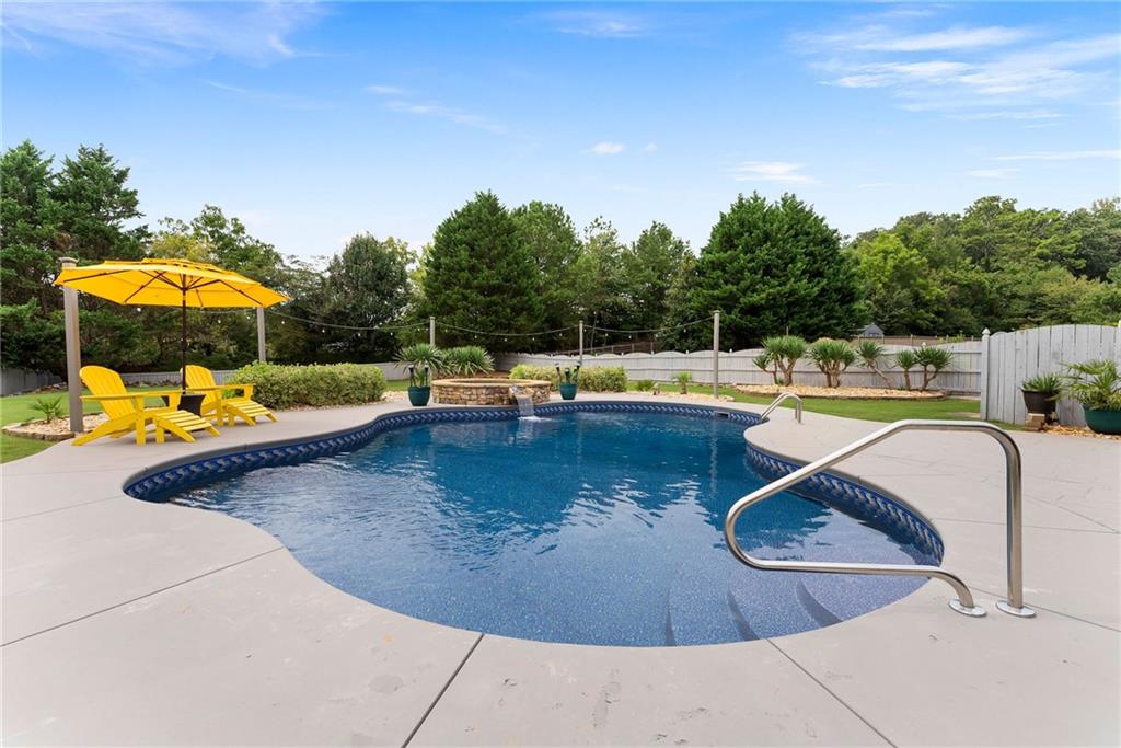 820 Nob Ridge Drive Southwest Marietta, GA 30064 - Photo 38 of 45 swimming pool view with a seating space