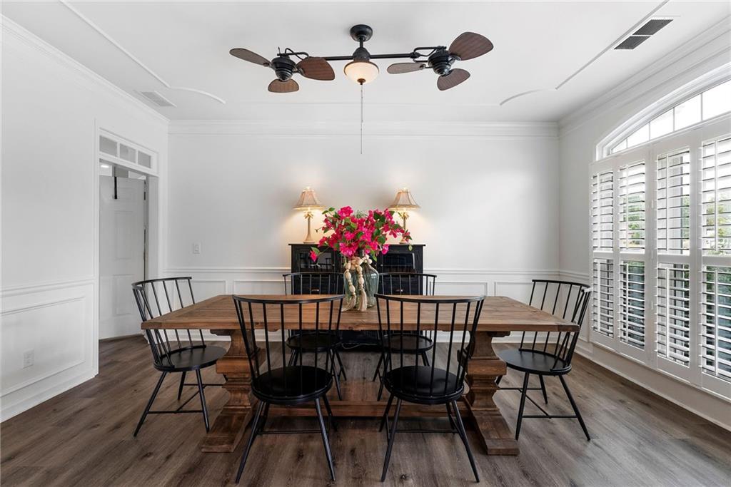 820 Nob Ridge Drive Southwest Marietta, GA 30064 - Photo 10 of 45 a view of a dining room with furniture wooden floor and chandelier
