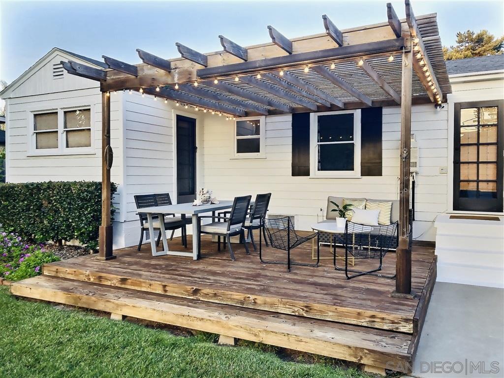 874 Arden Drive Encinitas, CA 92024 - Photo 1 of 25 a view of a patio with table and chairs