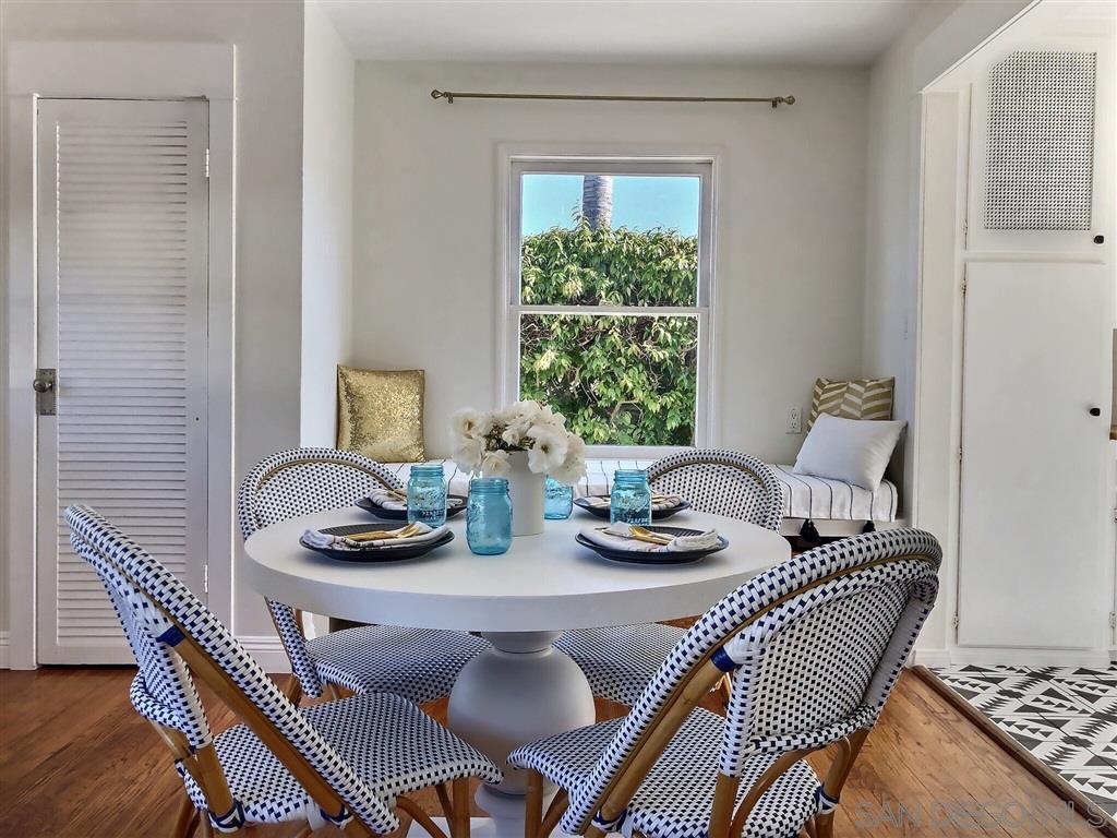 874 Arden Drive Encinitas, CA 92024 - Photo 11 of 25 a dining room with furniture and a window
