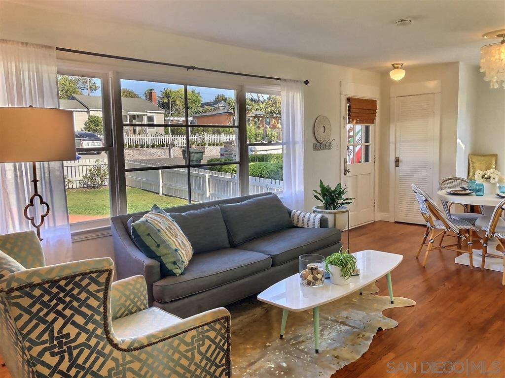 874 Arden Drive Encinitas, CA 92024 - Photo 13 of 25 a living room with furniture and a large window