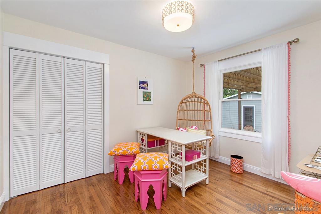 874 Arden Drive Encinitas, CA 92024 - Photo 17 of 25 a room with furniture and wooden floor