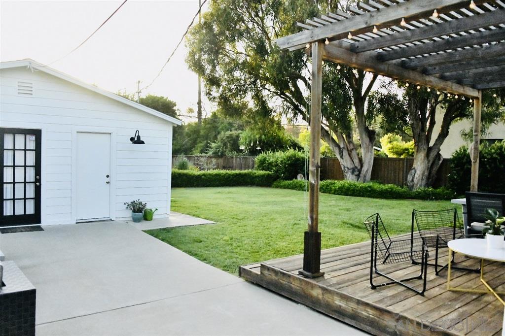 874 Arden Drive Encinitas, CA 92024 - Photo 19 of 25 a view of a porch with furniture and garden