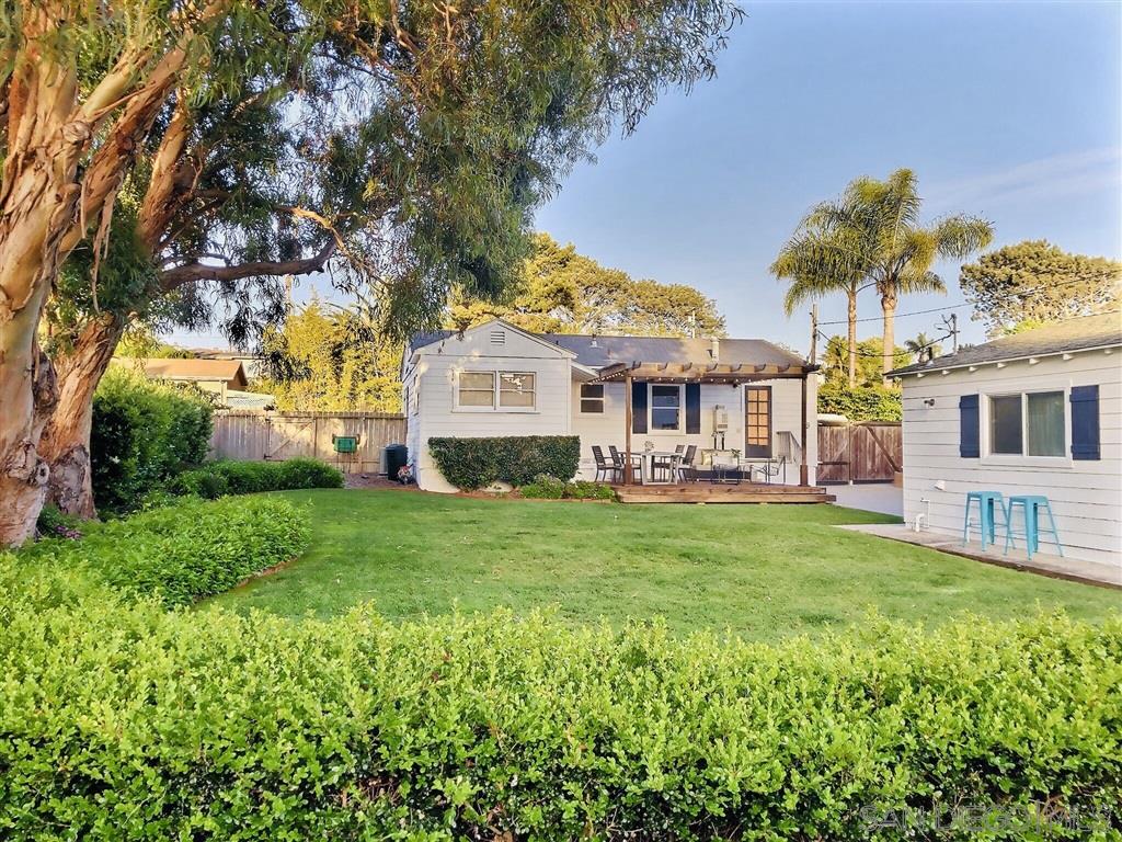 874 Arden Drive Encinitas, CA 92024 - Photo 2 of 25 a front view of a house with garden