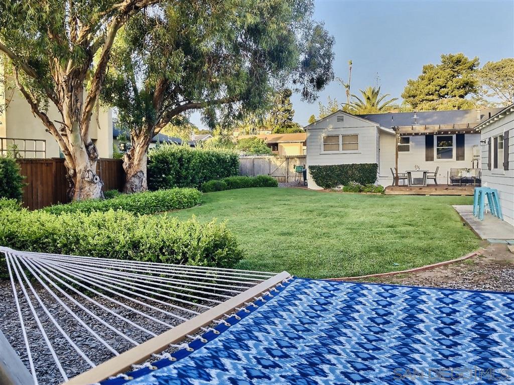 874 Arden Drive Encinitas, CA 92024 - Photo 21 of 25 a front view of a house with a yard