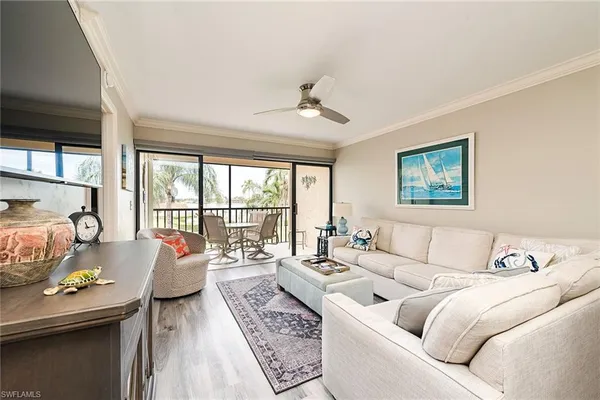 a living room with furniture and a table