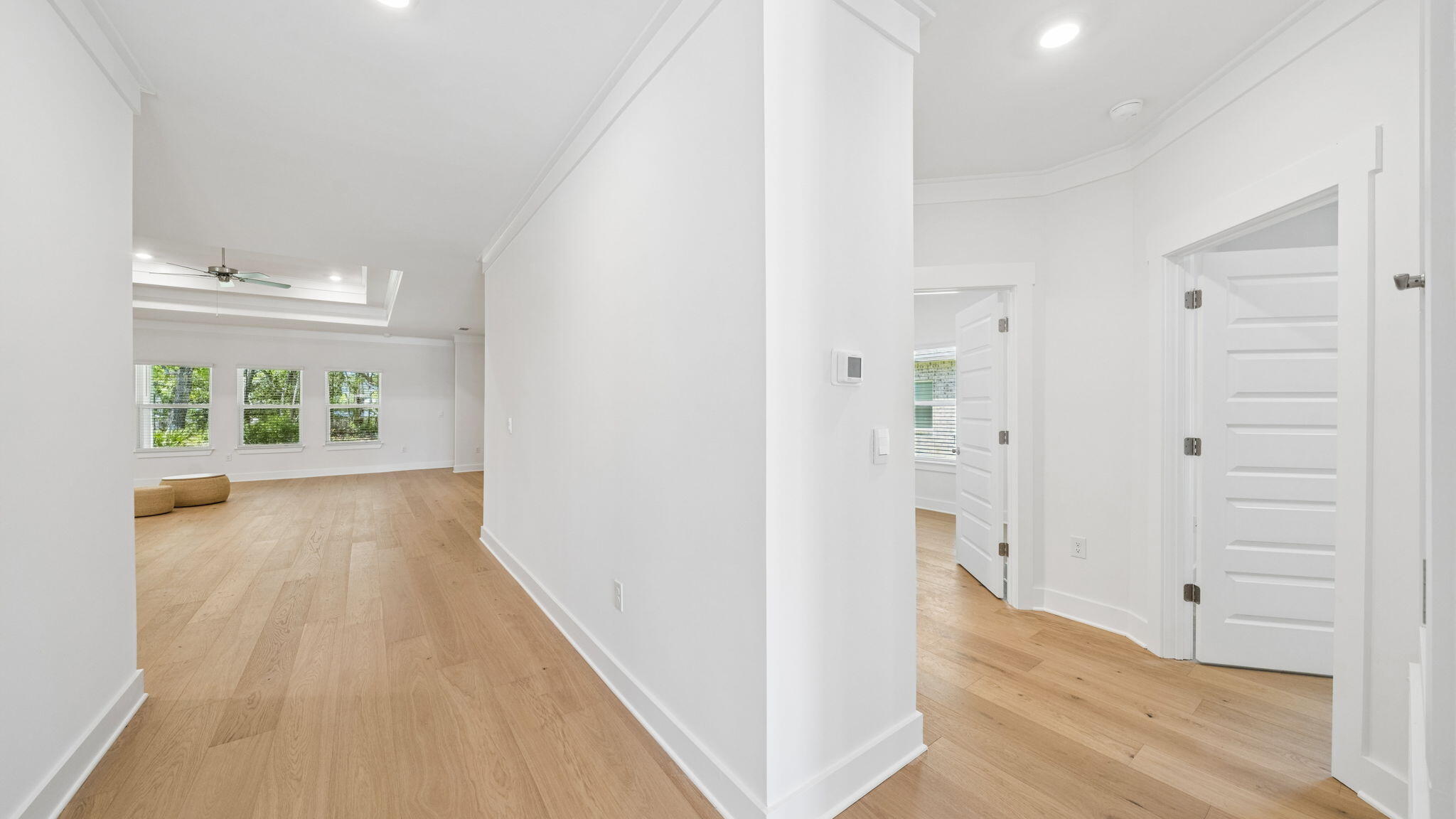 785 Old Ferry Road Santa Rosa Beach, FL 32459 - Photo 11 of 56 wooden floor in a hall with an entryway