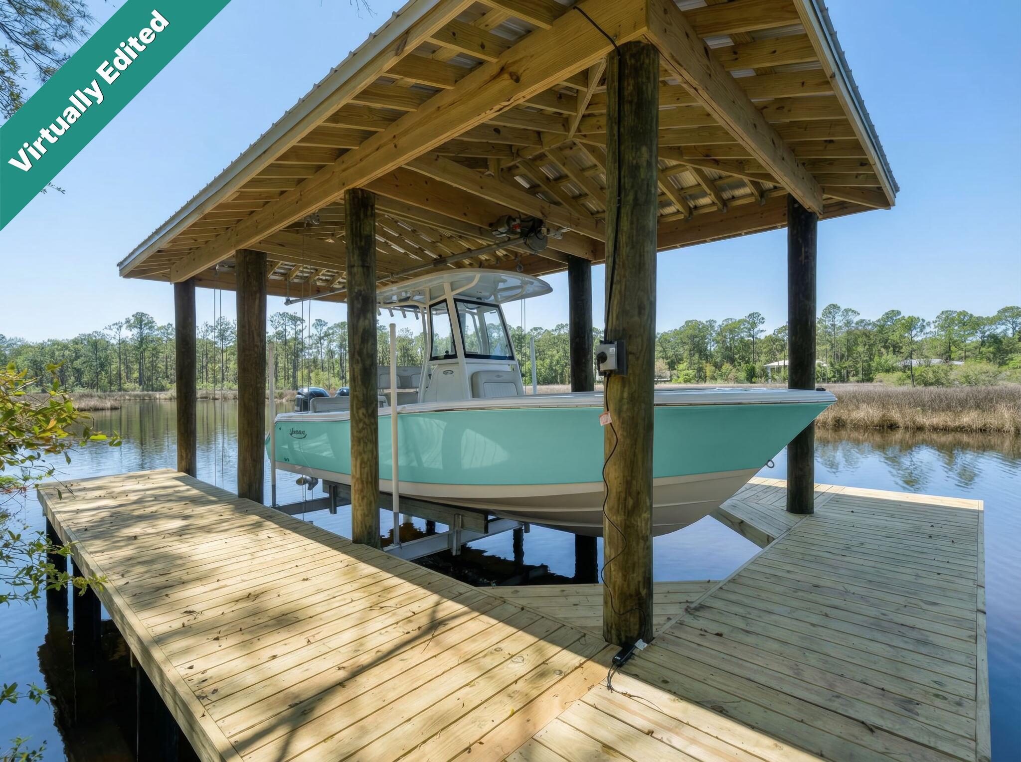 785 Old Ferry Road Santa Rosa Beach, FL 32459 - Photo 2 of 56 a view of swimming pool with a patio